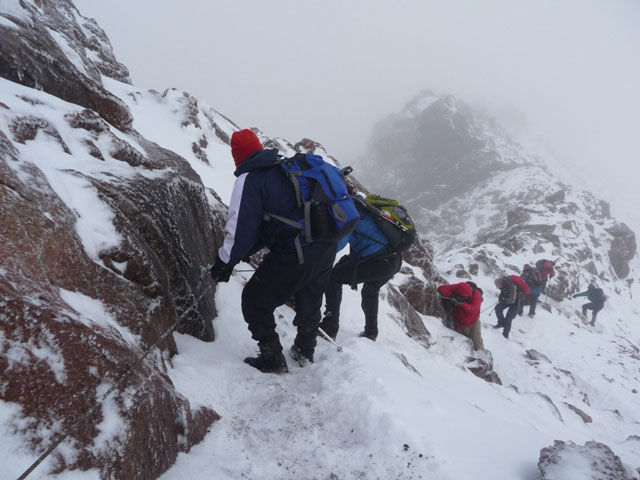 5 Days Mt. Kenya Sirimon Chogoria Route descending-from-lenana with Africa Alpine Expeditions